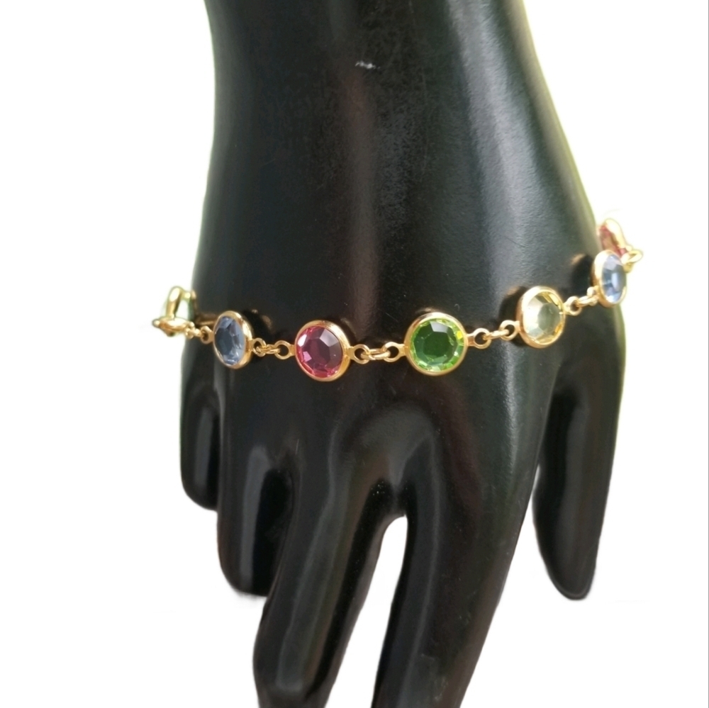SWAROVSKI 1980s MULTICOLOR BEZEL SET CRYSTAL & GOLDTONE TENNIS BRACELET